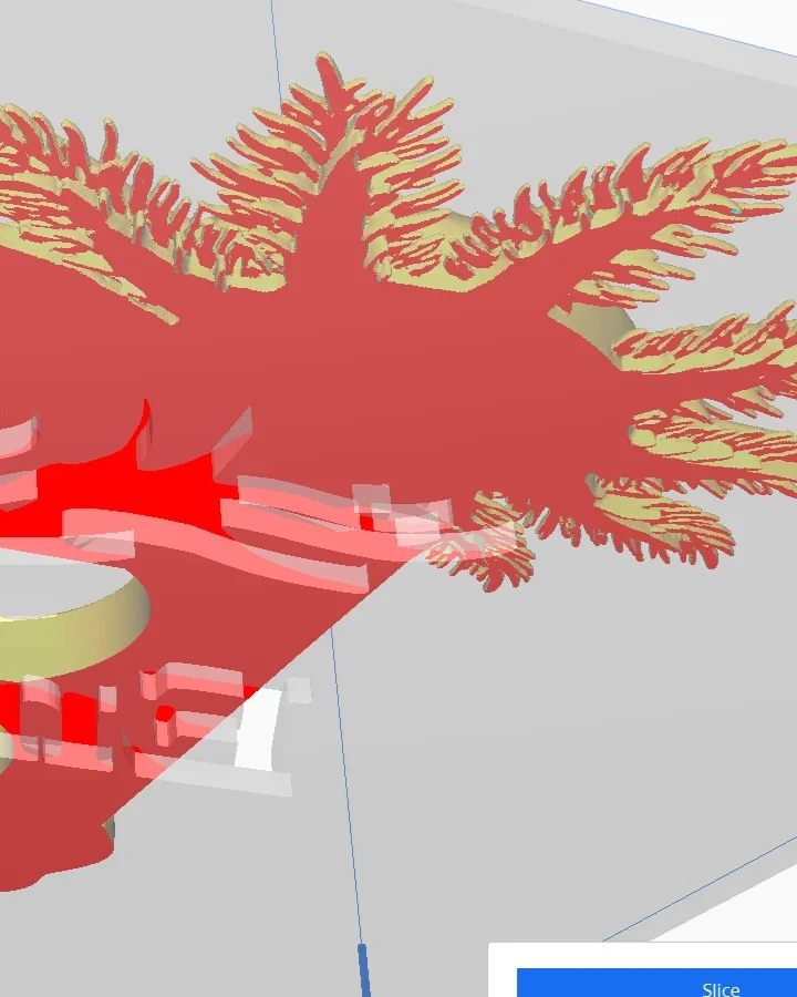 The unprocessed axolotl outlet cover in Cura: the whole underside of the gill fronds is flagged red